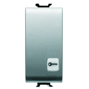 GW14152 - PULSANTE UNIPOLARE 250V ac - NA 16A ILLUMINABILE - CON LENTE NEUTRA SOSTITUIBILE - SIMBOLO CHIAVE - 1 MODULO - TITANIO - CHORUS 